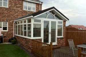 New conservatory roof with warm tiled system