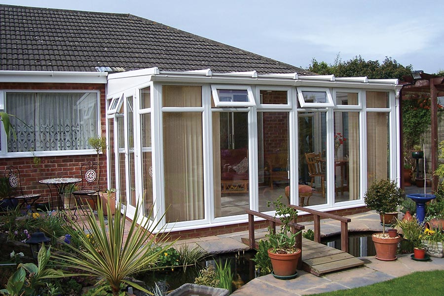 Small lean-to conservatory with upvc windows and doors and roof